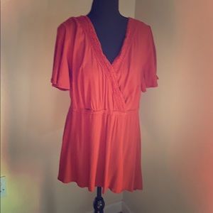 Rust colored baby doll top from torrid. Size zero